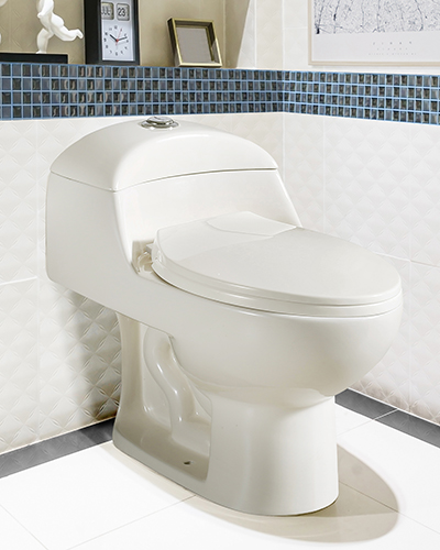 White urinal and washbasin and shower in granite bathroom, Moder